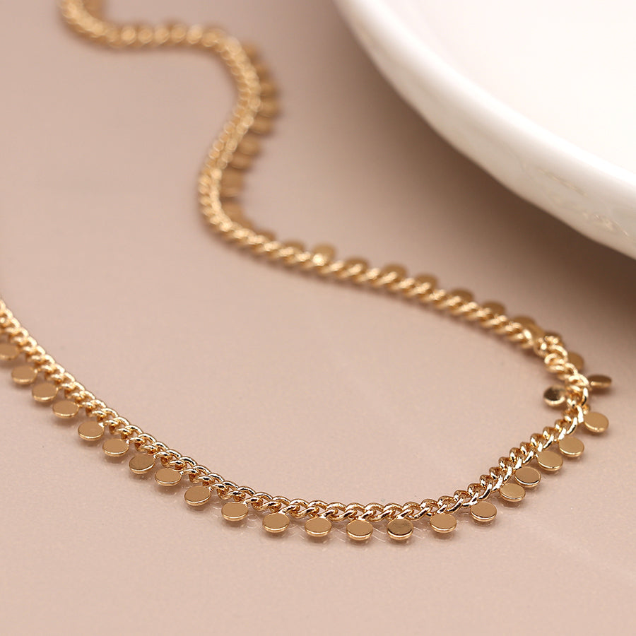 gold tiny discs necklace by POM