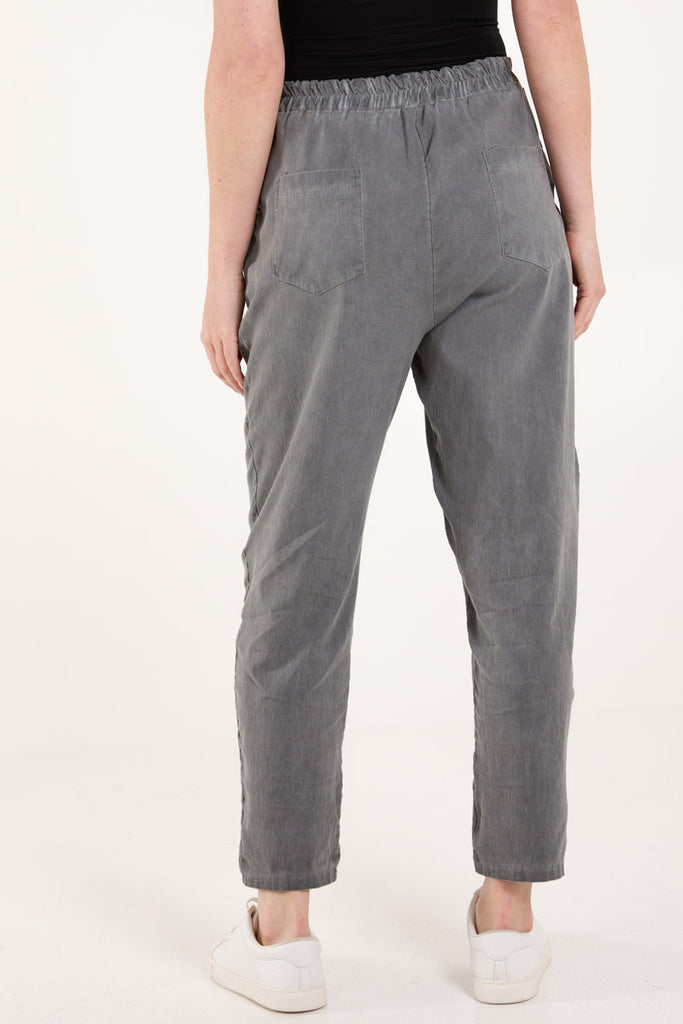 mid grey acid wash relaxed magic trousers rear view