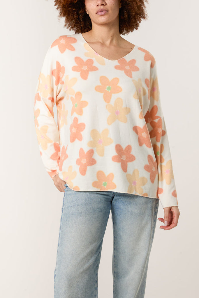 orange v neck daisy print jumper