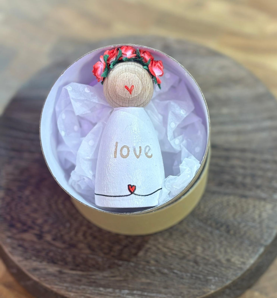 cute wooden valentines guardian angel with the word love handmade from wood